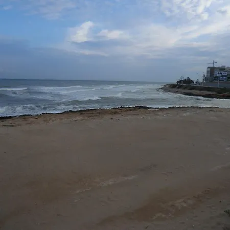 Апартаменти Casa En La Costa II Playa Los Locos *